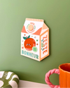 Décoration murale Brique de jus d'orange