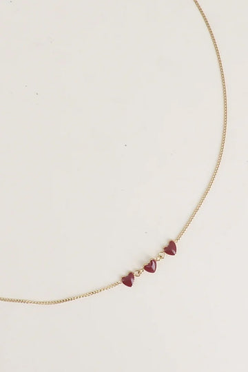 Collier 3 Petits Coeurs bordeaux