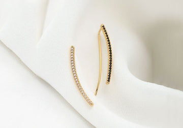 Boucle d'oreille Tom climber (noir ou blanc)